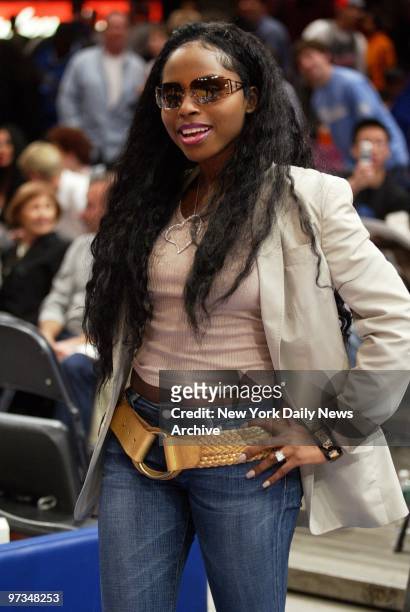 Rapper Foxy Brown is on hand to watch a game between the New York Knicks and the New Jersey Nets on New Year's Day at Madison Square Garden. The Nets...