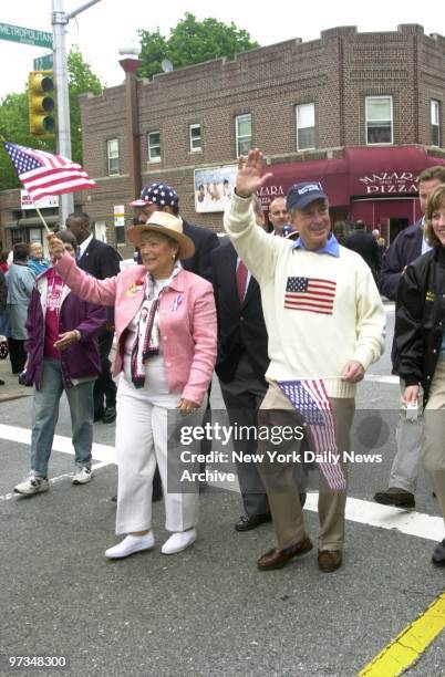 Queens Borough President Helen Marshall and Mayor Michael Bloomberg wave to the crowd as they march along Metropolitan Ave. In the Queens Memorial...