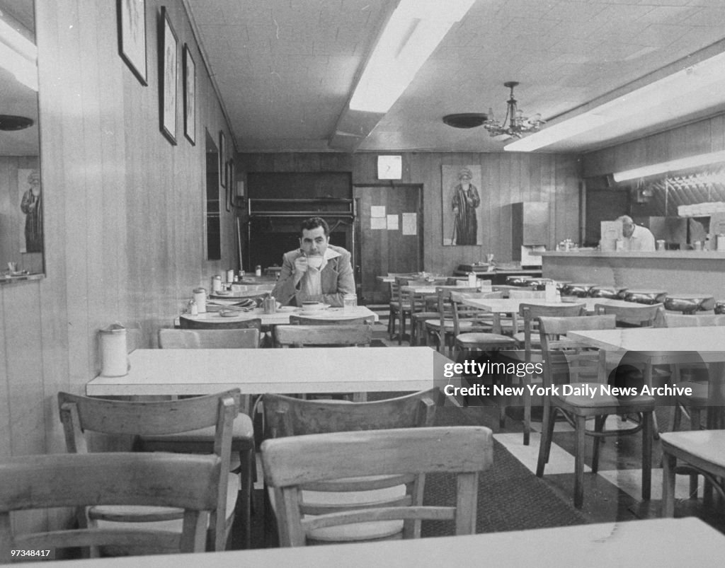 Rabbi Meir Kahane sits alone in Gefen's Dairy Restaurant.