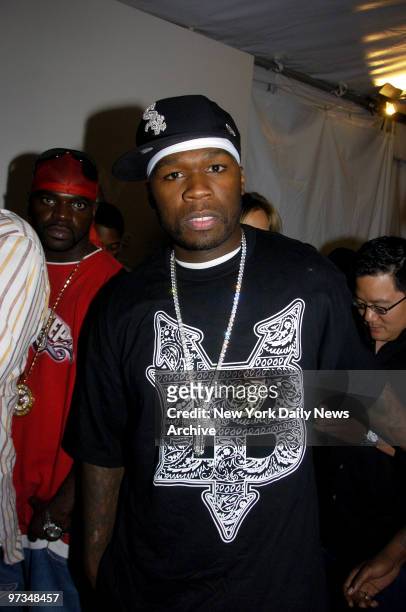 Rapper 50 Cent is backstage during a Fashion Week runway show of the Baby Phat spring 2007 collection in the Tent at Bryant Park. Earlier in the day,...