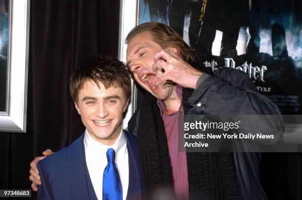 Ralph Fiennes clowns around with Daniel Radcliffe during the New York premiere of "Harry Potter and the Goblet of Fire" at the Ziegfeld Theatre on W....