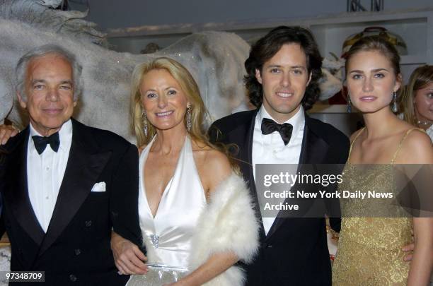 Ralph Lauren and wife Ricky are joined by their son, David, and his girlfriend, Lauren Bush, at the "7th On Sale Online" gala at Skylight Studios on...