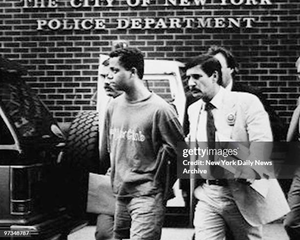 Rape and serial murder suspect Matias Reyes is taken by detectives from the W. 82d St. Station for booking.