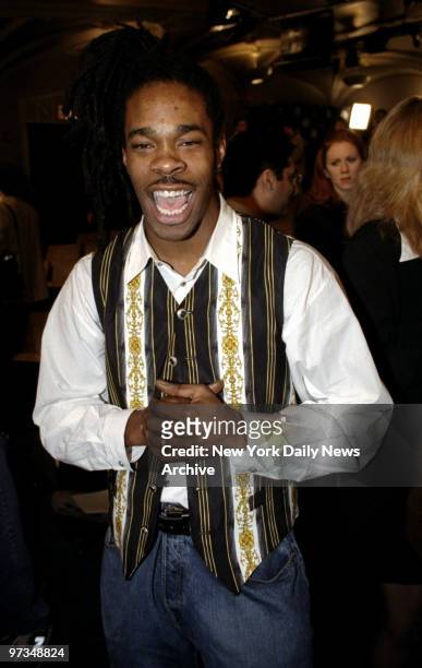 Rapper Busta Rhymes is all smiles after being nominated for an award at the 39th Grammy Awards Nominations ceremonies at the Ed Sullivan Theater.