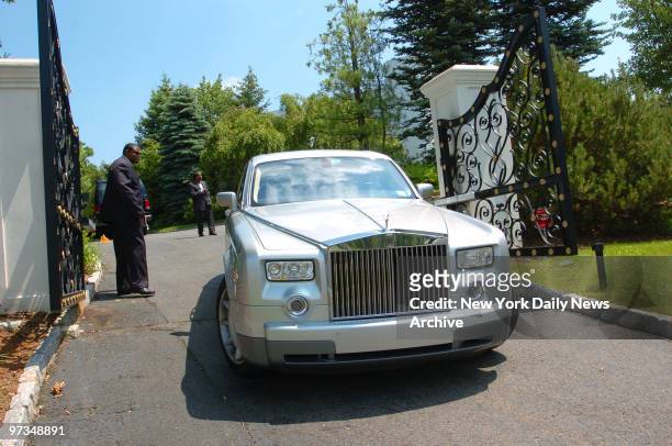 Rapper Lil' Kim arrives at her mansion in Alpine, N.J., in a Rolls Royce Phantom after spending 10 months in prison. The Grammy-winning rapper, whose...