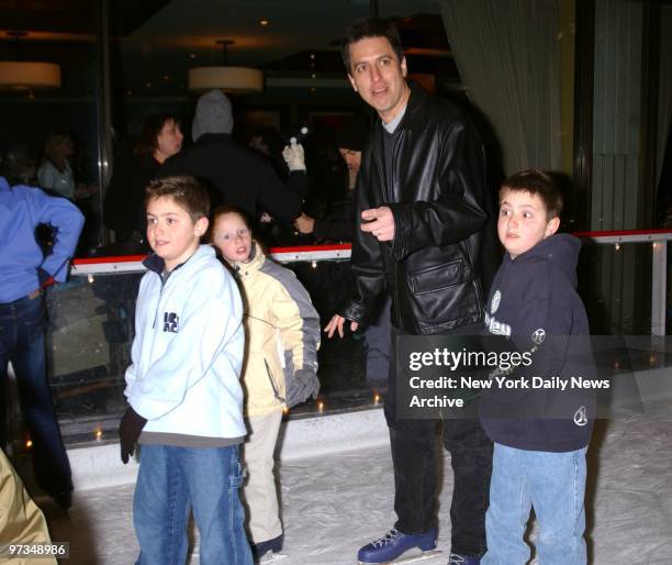 Ray Romano takes to the ice at Rockefeller Center rink with sons Matt and Gregory. Celebs turned out to celebrate the premiere of the movie "Ice...
