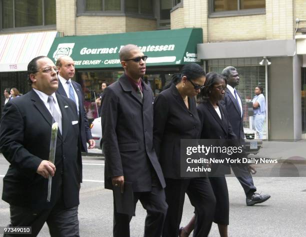 Rashad and Diane Haughton, Aaliyah's brother and mother , lead mourners along Madison Ave. From the Frank E. Campbell Funeral Chapel on E. 81st St....