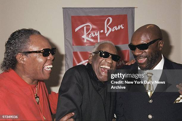 Ray Charles has a laugh with fellow R & B legends Sam Moore and Isaac Hayes at Ray-Ban bash at the Twirl Club.