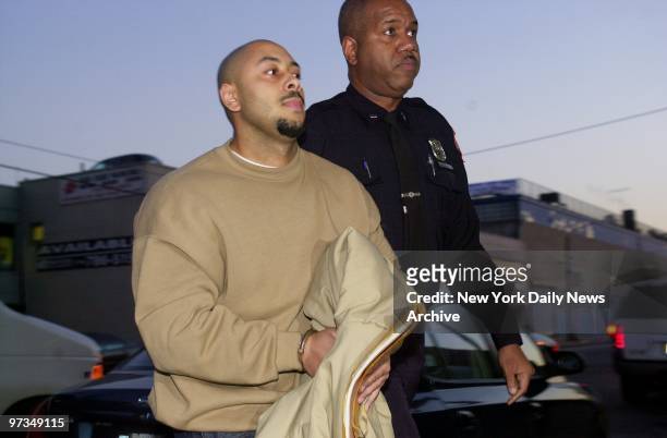 Raymond Santana, the last of the Central Park jogger defendants, is escorted from the Queensboro Correctional Facility in Long Island City. Santana...