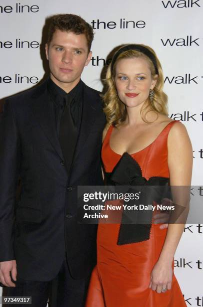 Reese Witherspoon and husband Ryan Phillippe are at the premiere of the movie "Walk the Line" at the Beacon Theater.