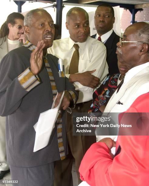 Rev. Herbert Daughtry, demonsrtates with his supporters of Percy Sutton in front of the Apollo Theatre at 253 West 125 Street.