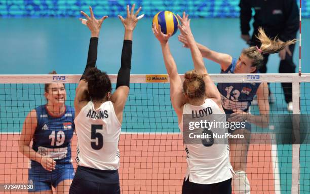 Of Serbia vies Rachael Adams and Carli Lloyd of USA in action during FIVB Volleyball Nations League on 12 June 2018 in Santa Fe, Argentina. The U.S....