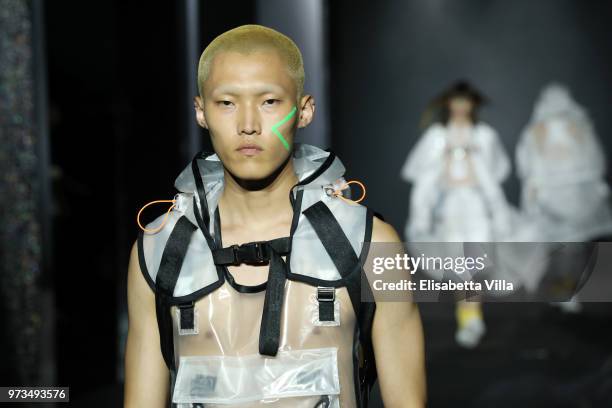 Model walks the runway at the MCM Fashion Show Spring/Summer 2019 during the 94th Pitti Immagine Uomo on June 13, 2018 in Florence, Italy.