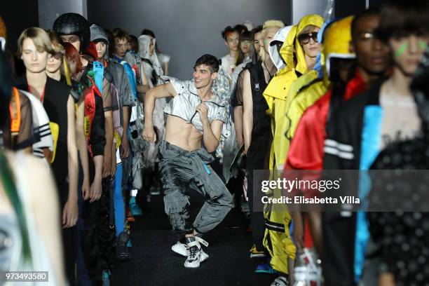 Dancers perform on the runway at the MCM Fashion Show Spring/Summer 2019 during the 94th Pitti Immagine Uomo on June 13, 2018 in Florence, Italy.