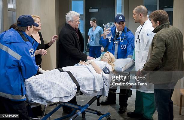 Extra, Erika Slezak , Jerry VerDorn , Bree Williamson , extra, Terrell Tilford and Mark Lawson in a scene that airs the week of February 22, 2010 on...