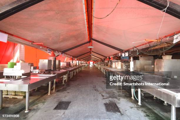 clean and empty outdoors fish market in chioggia, italy - zeltplatz stock-fotos und bilder