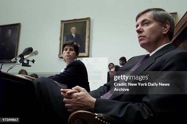 Reps. Mary Bono and Lindsey Graham listen to testimony at the House Judiciary Committee hearings on whether to impeach President Clinton.