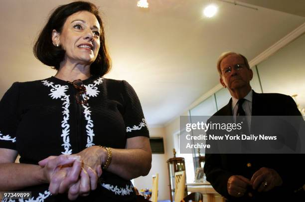 Republican Senate candidate Kathleen McFarland speaks to news media as former National Security Adviser Robert McFarlane stands by at the home of a...