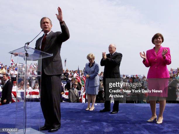 Republican presidential candidate George W. Bush addresses crowd during rally in Philadelphia, before the start of a whistle-stop campaign trip...