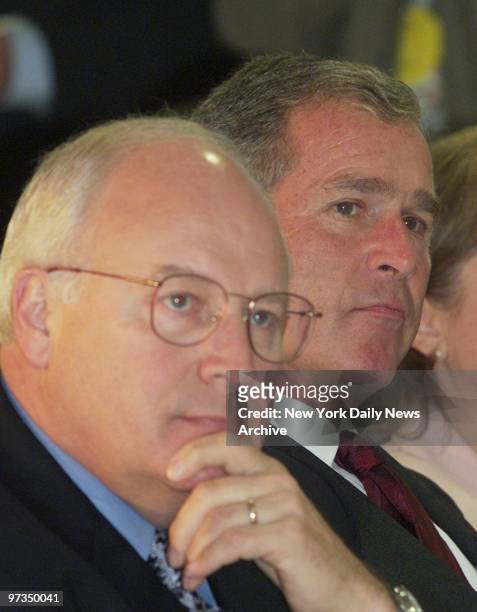 Republican presidential candidate George W. Bush and his running mate, Dick Cheney, look on as they were welcomed at Gross Towers, a senior citizen...