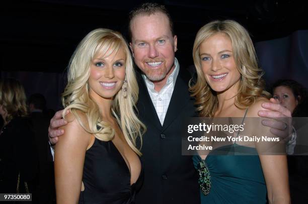 Retired baseball slugger Mark McGwire and wife Stephanie join model Carolyn Murphy at Aer lounge for a party launching the 2005 Sports Illustrated...