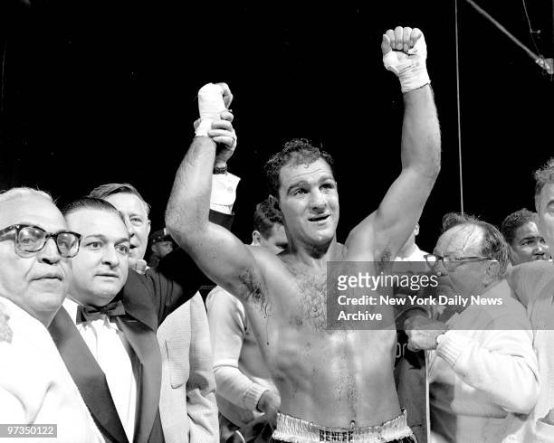 Rocky Marciano is victorious over Harry Matthews at Yankee Stadium.