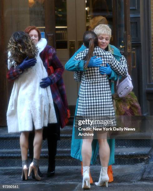 Sarah Jessica Parker hugs Cynthia Nixon as Kristin Davis and Kim Cattrall embrace outside a SoHo art gallery during filming of a scene for the last...