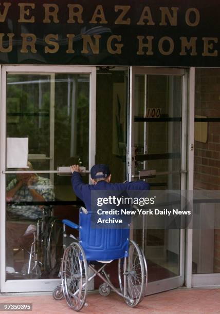 Resident opens door at Staten Island's Verrazano Nursing Home, where federal inspectors found 70 of 105 residents were being restrained in their beds...