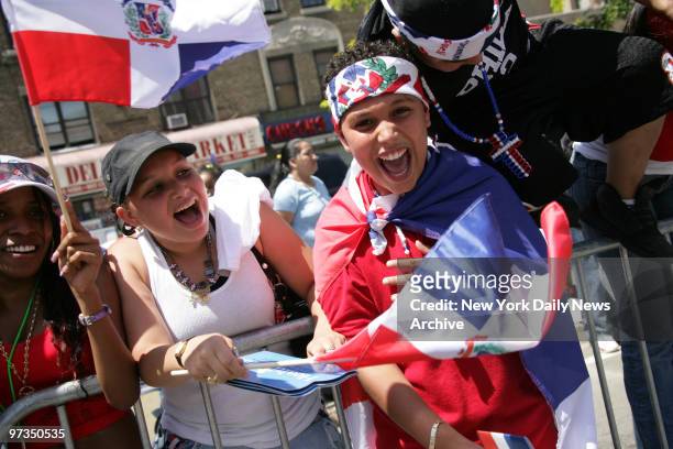 Revelers come out for the Dominican Day Parade on the Grand Concourse in the Bronx