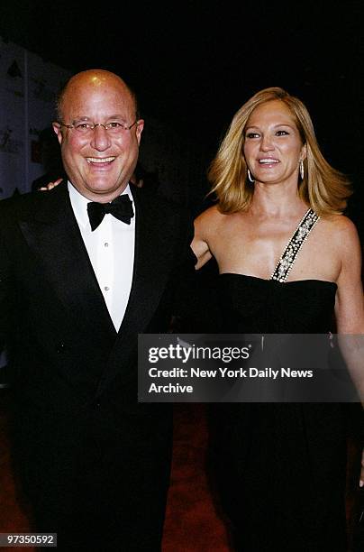 Revlon billionaire Ron Perelman and actress Ellen Barkin are on hand for the Council of Fashion Designers of America awards at Avery Fisher Hall.