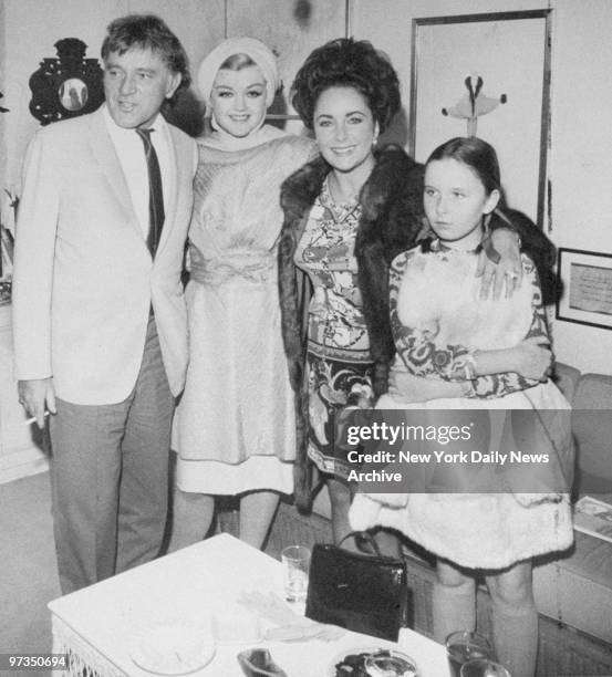 Richard Burton, Angela Lansbury, Elizabeth Taylor and her daughter, Kate .