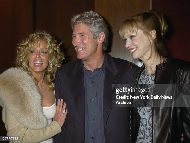 Richard Gere is flanked by Farrah Fawcett and Shelley Long at premiere of the movie "Dr. T and the Women" at the Ziegfeld Theater. All three star in...