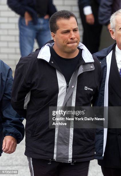 Richard G. Gotti, nephew of jailed mob boss John Gotti, is led out of the Waterfront Commission by police after being arrested along with 16 other...