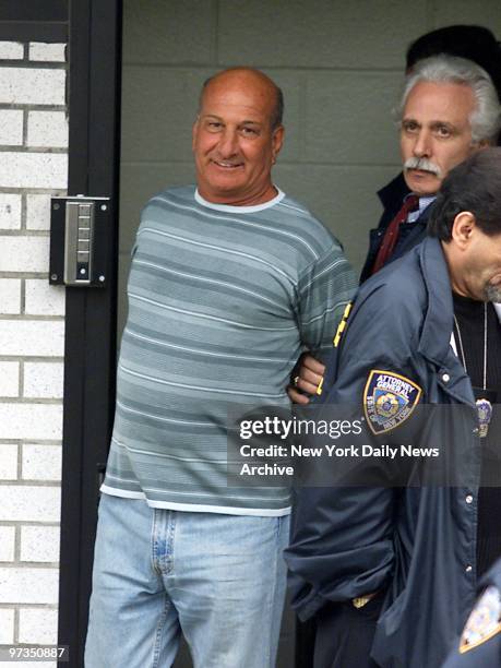 Richard V. Gotti, brother of jailed mob boss John Gotti, is led out of the Waterfront Commission by police after being arrested along with 16 other...