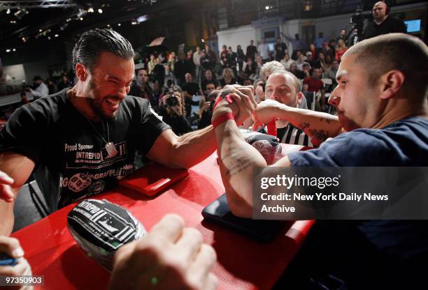 Richie Calero struggles against Angel Cosme in a first-round matchup during the New York City Big Apple Grapple XXIX USA/International Pro Arm...