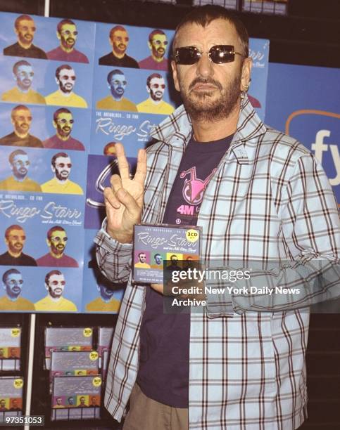 Ringo Starr wants to make sure no one misses his new CD, "Ringo Starr, the Anthology...so far," at FYE record store on Sixth Avenue.