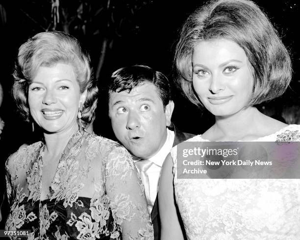 Rita Hayworth, Buddy Hackett, Sophia Loren attending party for Loren at the Four Seasons.