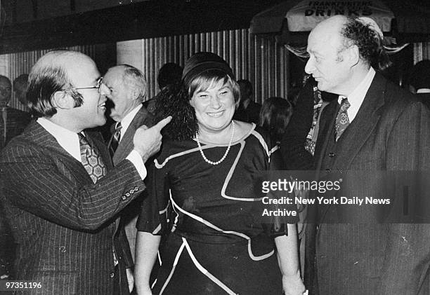 Robert Abrams makes a point with Bella Abzug and Rep. Ed Koch during reception for Gov. Hugh Carey.