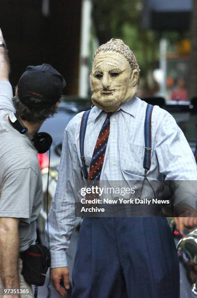 Robert Downey Jr. Wears a mask during the filming of the movie "Fur" on E. 54th St. He plays the part of a neighbor in the film, based on Patricia...