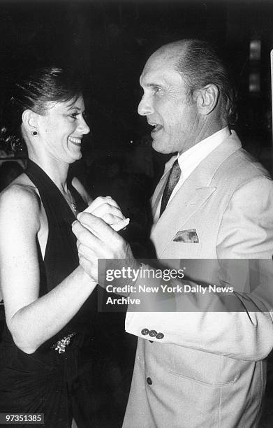 Robert Duvall dances with his girlfriend Sharon Brophy.