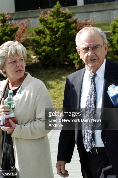 Robert Pelosi and his second wife, Dorothy, leave Suffolk County Supreme Court in Riverhead, L.I., where his son, Daniel Pelosi, is on trial on...