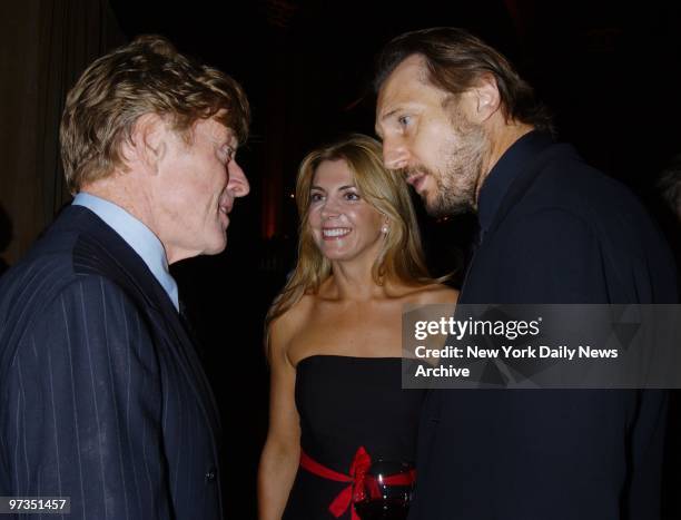 Robert Redford chats with Liam Neeson and wife Natasha Richardson at the Roundabout Theatre Company's 2002 Spring Gala at Cipriani 42nd Street.