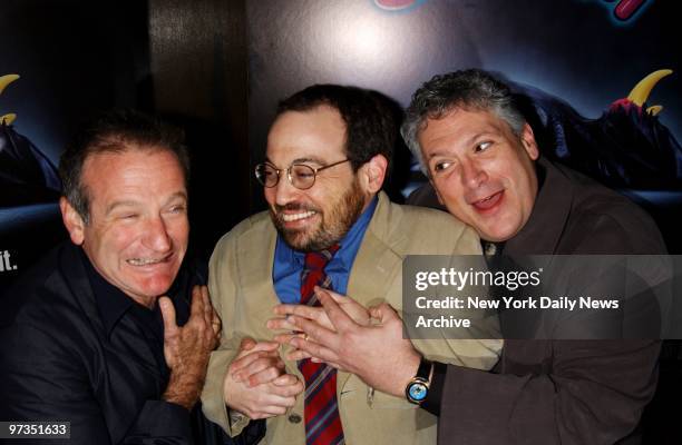 Robin Williams emotes to the delight of Danny Woodburn and Harvey Fierstein at the premiere of the movie "Death to Smoochy" at the Ziegfeld Theatre....