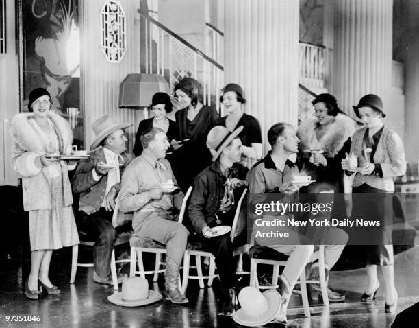 Rodeo Cowboys were given afternoon tea by Society Debutantes at the Waldorf Astoria Roof. Carolyn Hughes, Mrs. Harry Wagner, Alma Clayburgh, Rose...