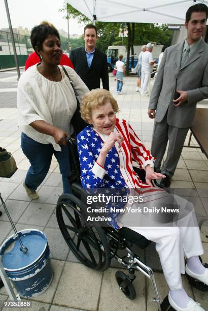 Roger Clemens' mother, Bess, is decked out in stars and stripes as she arrives at Yankee Stadium to see her son pitch as the New York Yankees take on...