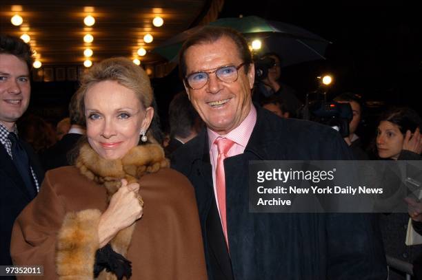 Roger Moore and wife Kristina are on hand to see the opening night performance of "The Play What I Wrote" at the Lyceum Theater on W. 45th St.