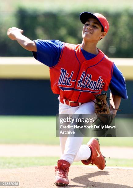 Rolando Paulino All-Stars' Luilly Vinas pitches against team from Davenport, Iowa, in the second game of the 2001 Little League World Series at...