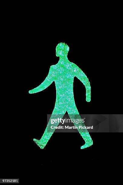 green pedrestrian crossing man - walk dont walk signal stock pictures, royalty-free photos & images