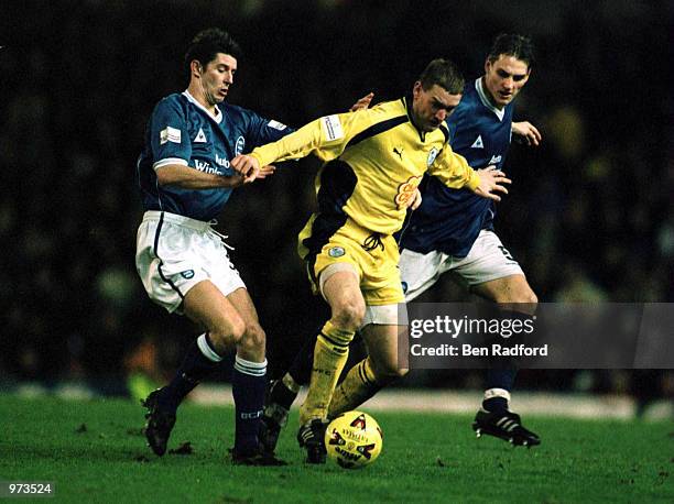 Andy Booth of Sheffield gets past Darren Purse and Danny Sonner of Birmingham during the match between Birmingham City and Sheffield Wednesday in the...