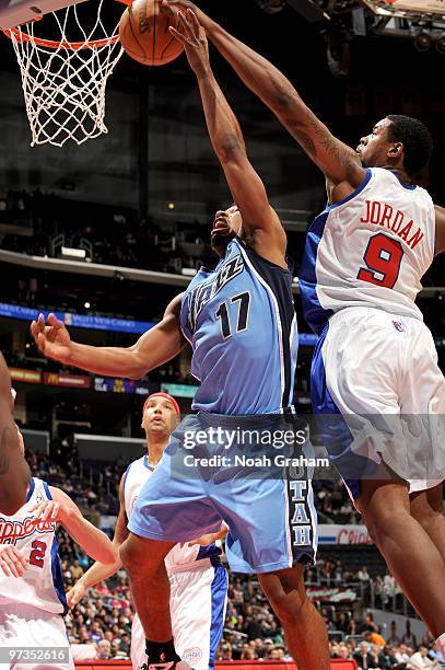 DeAndre Jordan of the Los Angeles Clippers blocks a shot from Ronnie Price of the Utah Jazz at Staples Center on March 1, 2010 in Los Angeles,...